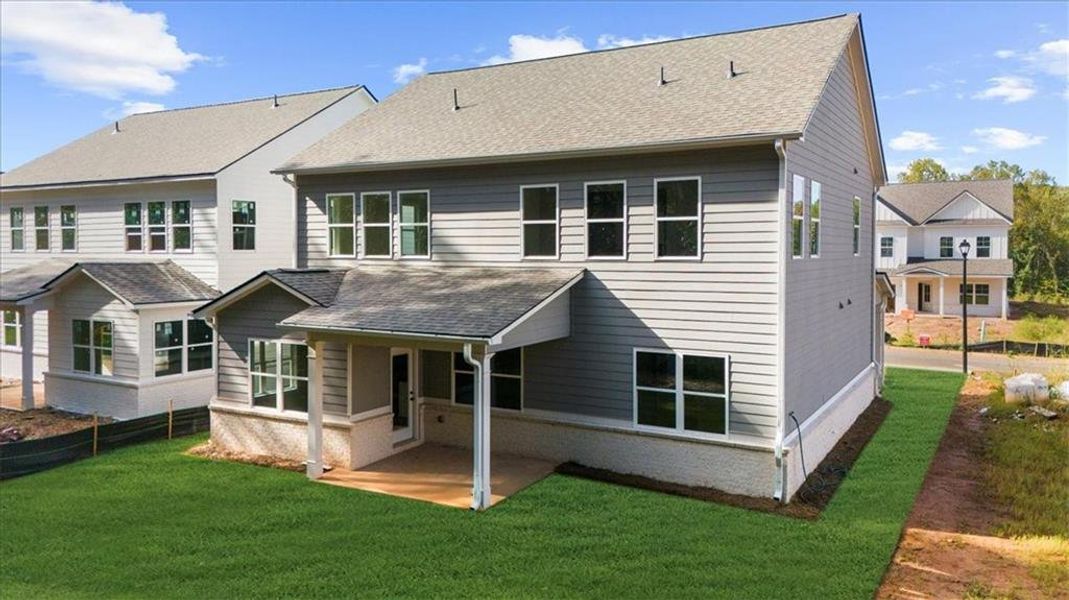 Exterior details and patio area of a home in , Flowery Branch (Image 25).