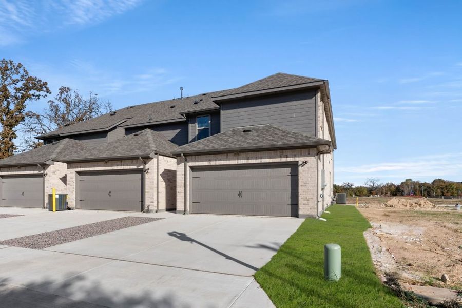 Representative exterior photo of a completed home built from the Lavon by Impression Homes in Timber Ridge, Corinth, TX (Image 23).