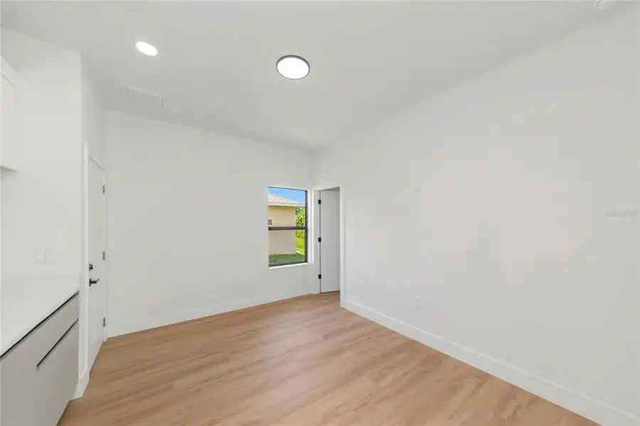 Spacious, unfurnished interior of a new home in , North Port (Image 30).