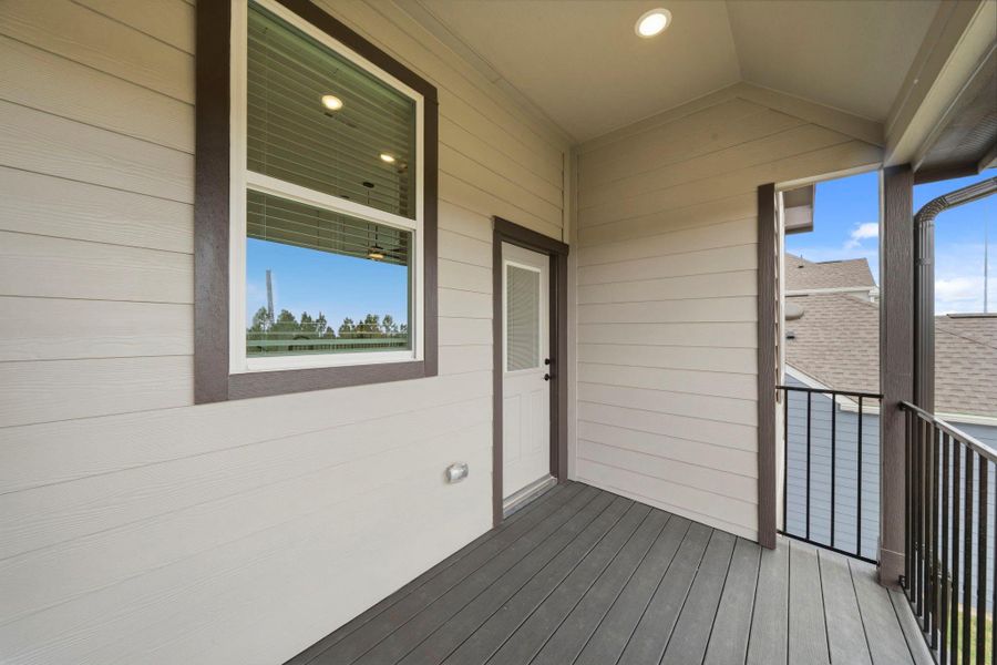 Exterior details and patio area of a home in Bridgeland, Cypress (Image 4).