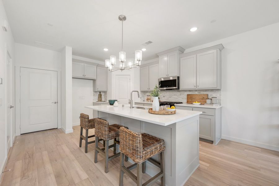 Furnished interior view inside a new home in Willow Grove Townhomes, Melissa (Image 9).