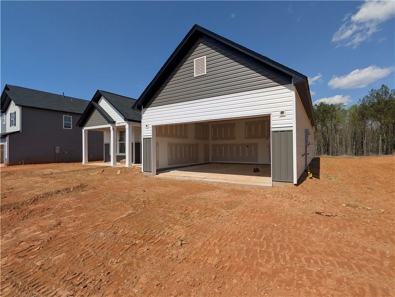 This new construction features a two-car garage, o This new construction features a two-car garage, o