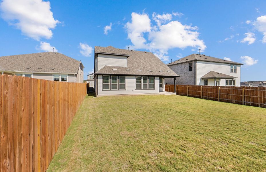 Exterior details and patio area of a home in Saddleback at Santa Rita Ranch, Liberty Hill (Image 3). Exterior details and patio area of a home in Saddleback at Santa Rita Ranch, Liberty Hill (Image 3).