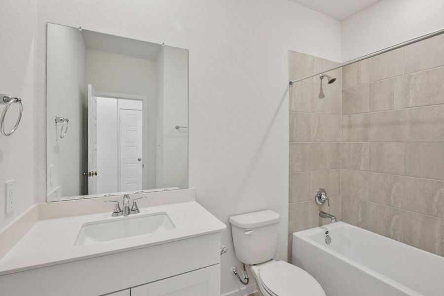 Furnished interior view inside a new home in Sanford Farms - Traditional Series, Waller (Image 7).