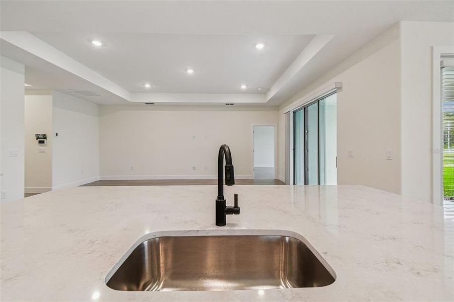 Furnished interior view inside a new home in Hidden Ridge, New Port Richey (Image 6). Furnished interior view inside a new home in Hidden Ridge, New Port Richey (Image 6).
