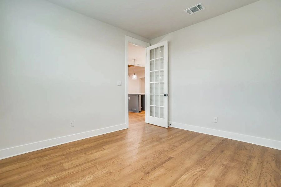 Representative unfurnished interior of a home built from the The Magnolia by Elmwood Custom Homes in Waterfall Ranch Estates, Waxahachie (Image 20).
