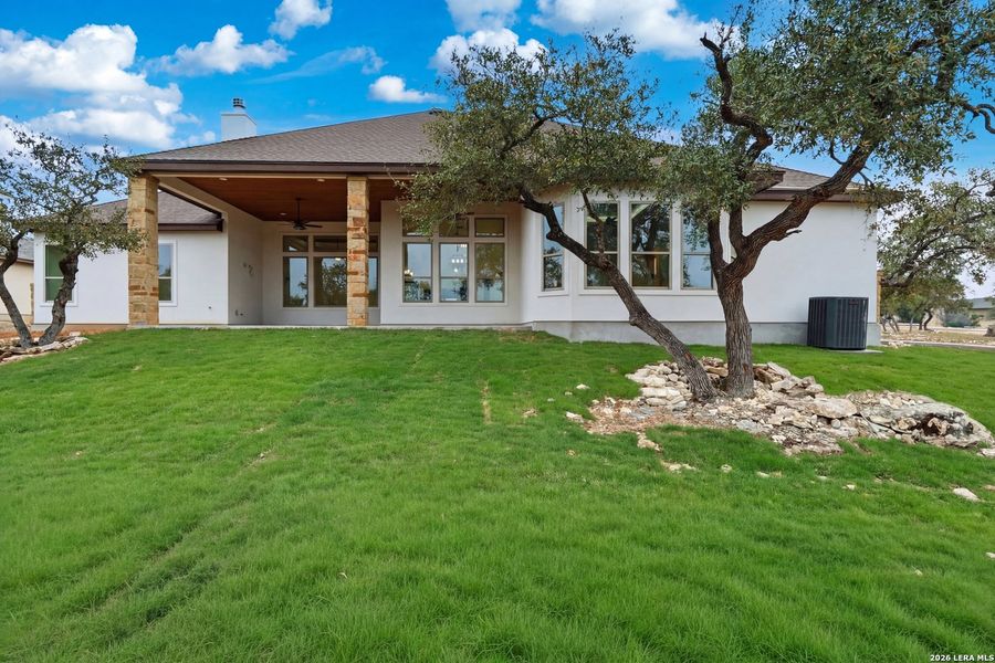 Exterior details and patio area of a home in , Spring Branch (Image 3). Exterior details and patio area of a home in , Spring Branch (Image 3).