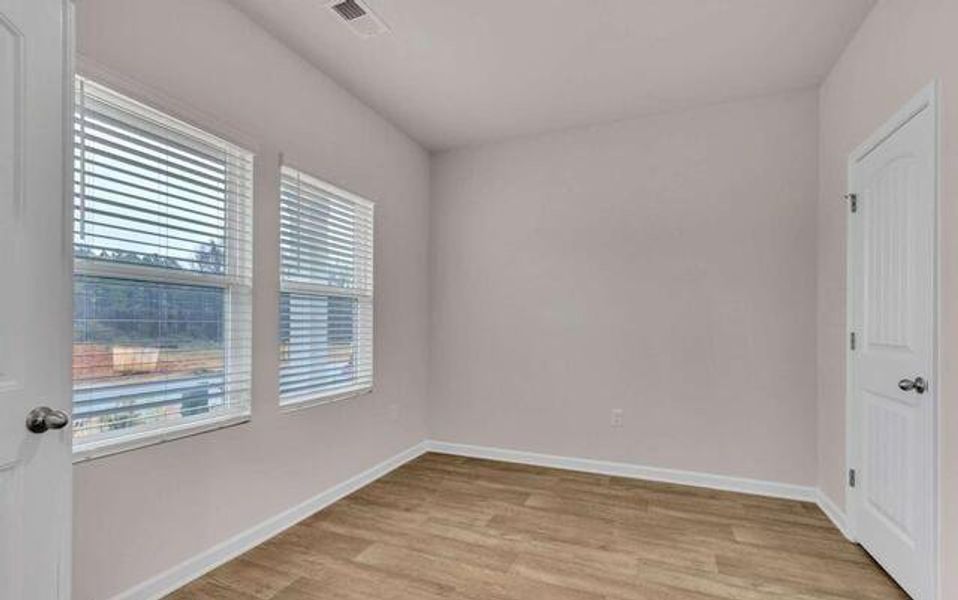 Spacious, unfurnished interior of a new home in River Walk Farm, Covington (Image 8).