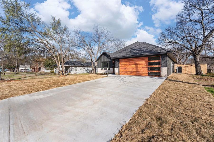 Front exterior of a new home in , Hillsboro, TX, highlighting curb appeal (Image 1). Front exterior of a new home in , Hillsboro, TX, highlighting curb appeal (Image 1).