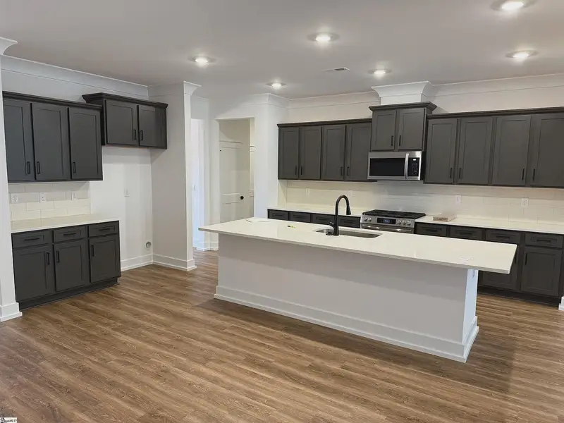 Furnished interior view inside a new home in Hidden Lake Estates, Greenville (Image 5).