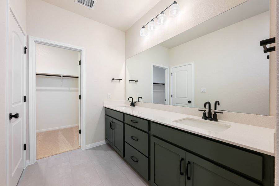 Representative furnished interior of a home built from the Robin by Ashton Woods in The Cottages at Lariat, Liberty Hill (Image 15). Representative furnished interior of a home built from the Robin by Ashton Woods in The Cottages at Lariat, Liberty Hill (Image 15).