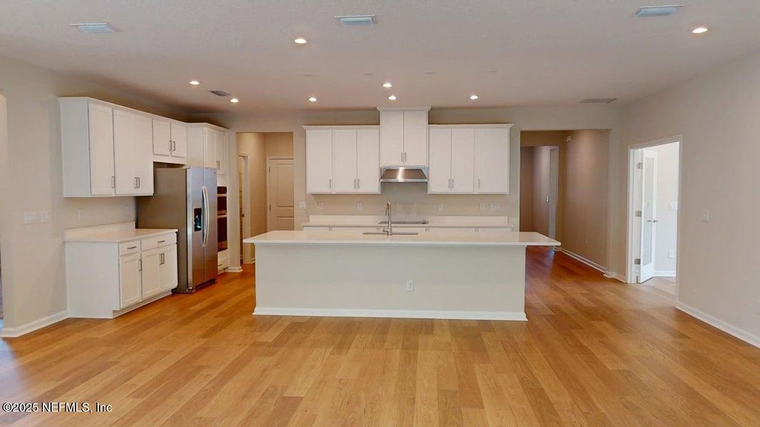 Furnished interior view inside a new home in Lakes at Bella Lago, Green Cove Springs (Image 4).
