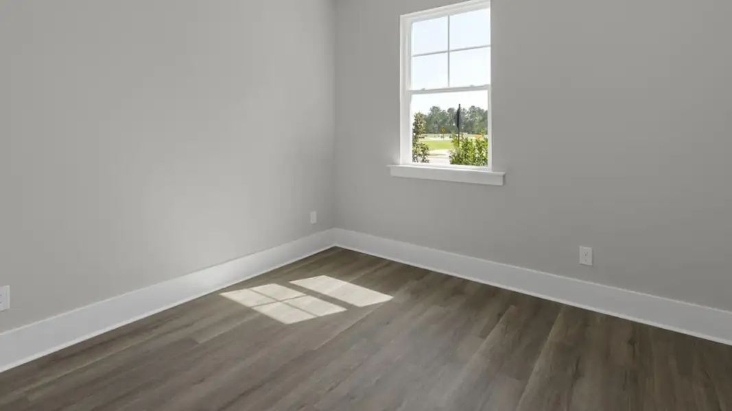 Spacious, unfurnished interior of a new home in The Retreat at Indigo Preserve Townhomes, Leland (Image 21).