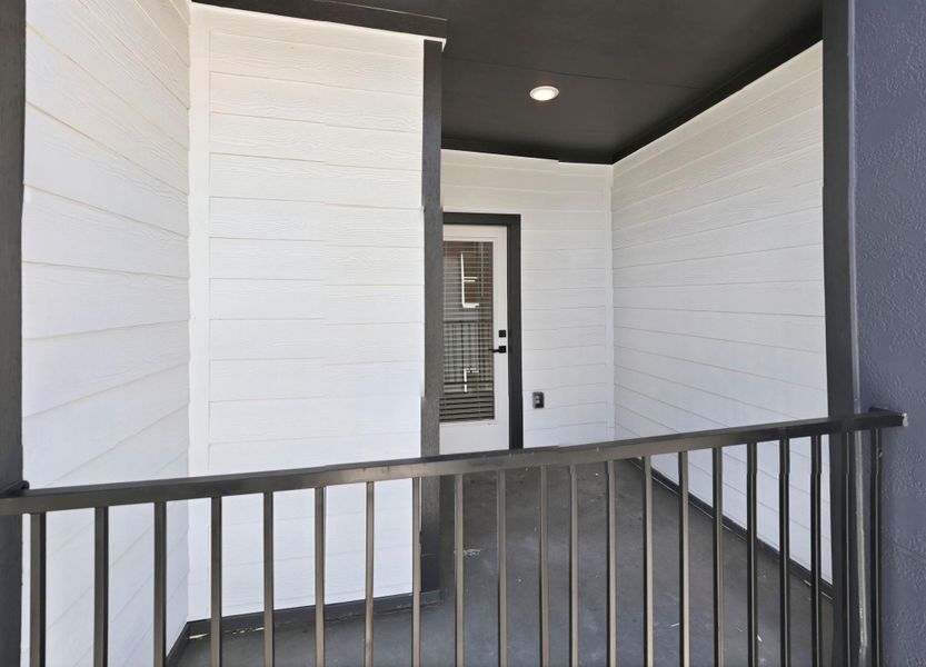 Private balcony located on an upper floor, offering an outdoor extension of the living space.