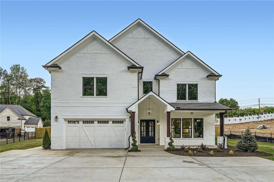 Front exterior of a new home in , Grayson, GA, highlighting curb appeal (Image 1).
