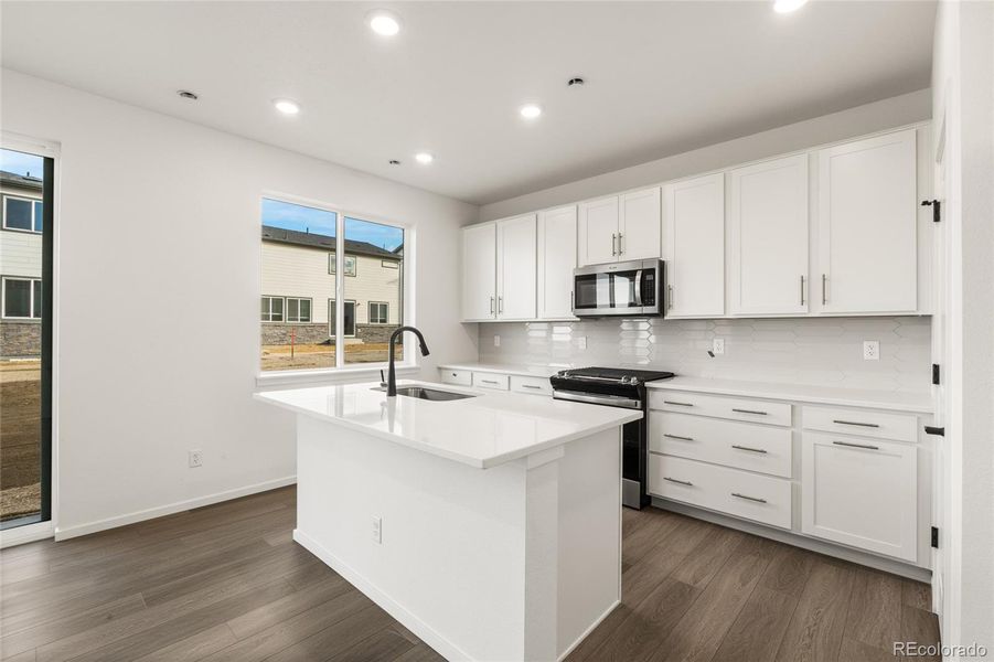 Furnished interior view inside a new home in Harvest Crossing, Aurora (Image 11).