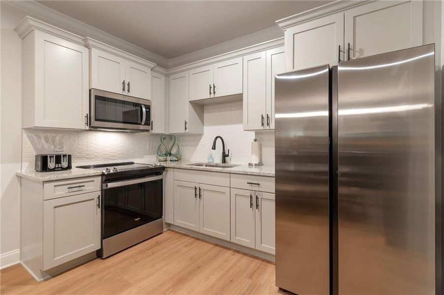 Furnished interior view inside a new home in , Dacula (Image 28).