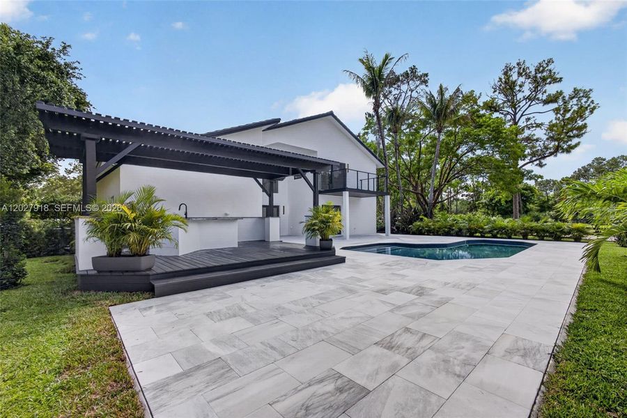 Exterior details and patio area of a home in , Palm Beach Gardens (Image 40).