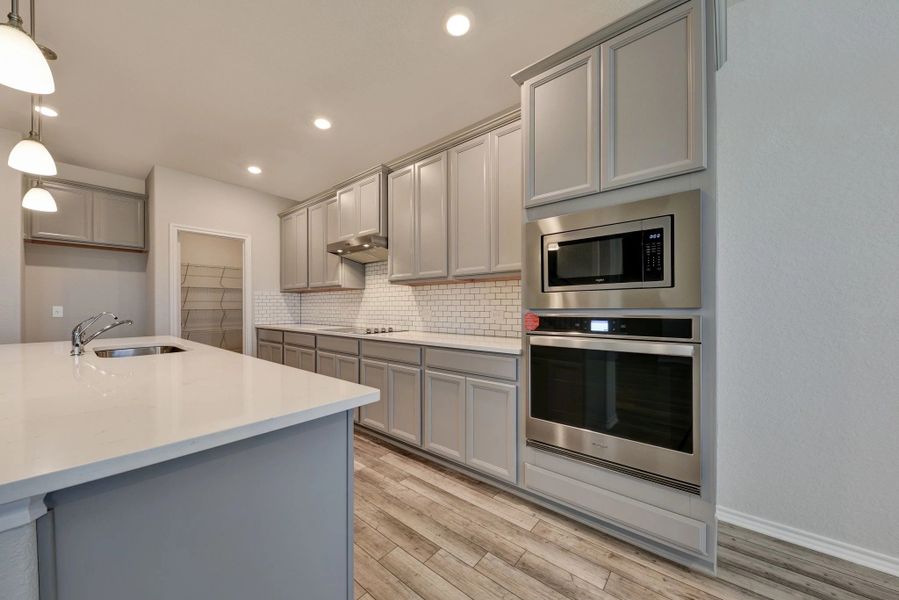 Representative furnished interior of a home built from the Devon by Ashton Woods in Cordova Trails, Seguin (Image 7).