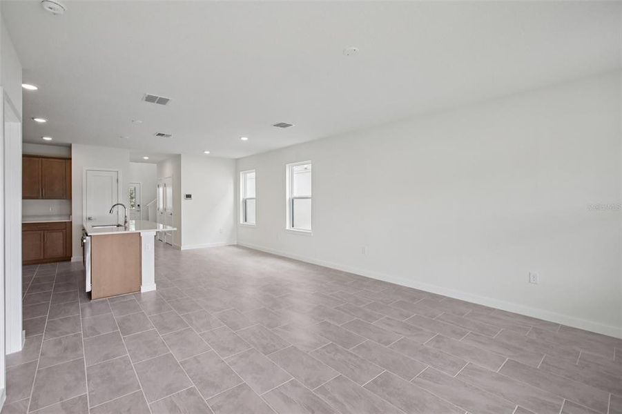 Spacious, unfurnished interior of a new home in Grasslands West, Lakeland (Image 44).