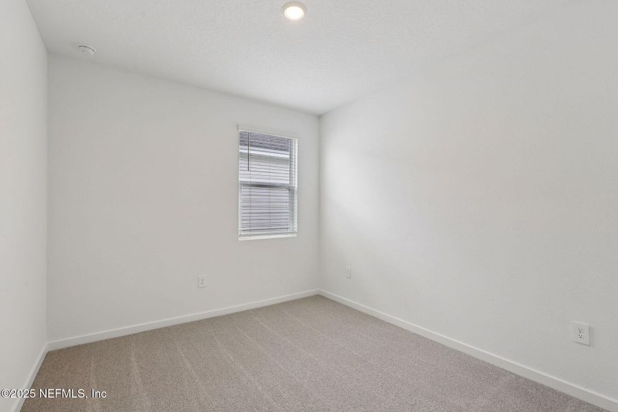 Spacious, unfurnished interior of a new home in Lakes at Bella Lago - Signature Series, Green Cove Springs (Image 12). Spacious, unfurnished interior of a new home in Lakes at Bella Lago - Signature Series, Green Cove Springs (Image 12).