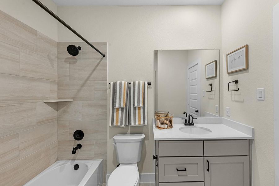 Furnished interior view inside a new home in Bridgeland, Cypress (Image 22).