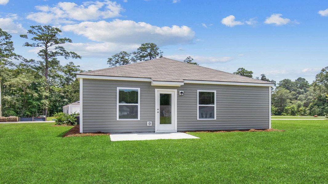 Front exterior of a new home in Rice Hope, Port Wentworth, GA, highlighting curb appeal (Image 2). Front exterior of a new home in Rice Hope, Port Wentworth, GA, highlighting curb appeal (Image 2).