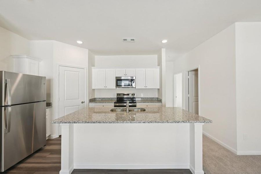 Furnished interior view inside a new home in Willow Springs, Buda (Image 6).