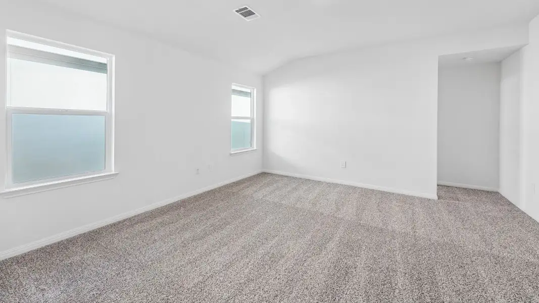 Spacious, unfurnished interior of a new home in Bar W Ranch, Leander (Image 22).