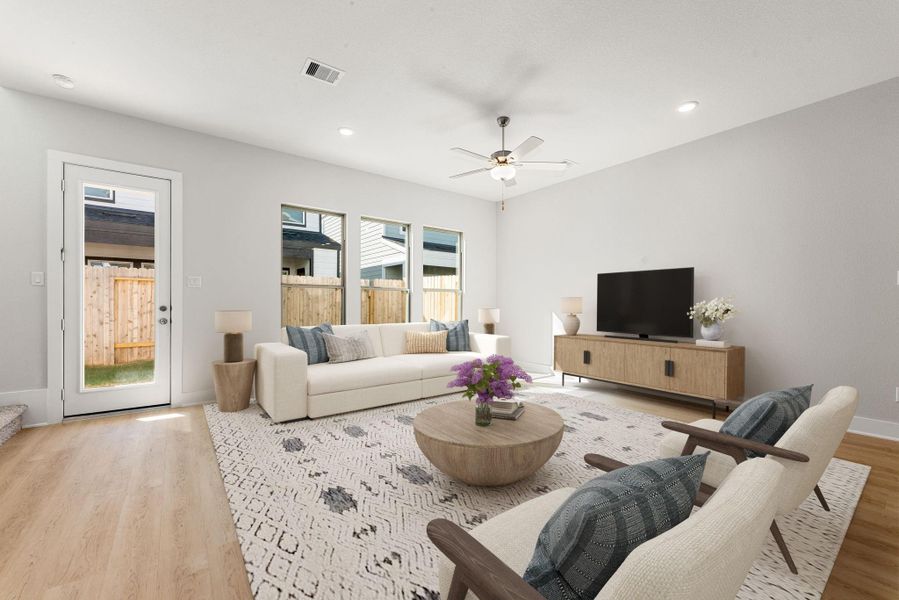 This inviting living space is filled with natural light streaming through large windows, highlighting the clean lines and soft color palette. The open layout offers a seamless connection to the kitchen and outdoor area, creating a comfortable setting for everyday living. Sleek finishes and thoughtful design details give the room a bright, modern appeal. This inviting living space is filled with natural light streaming through large windows, highlighting the clean lines and soft color palette. The open layout offers a seamless connection to the kitchen and outdoor area, creating a comfortable setting for everyday living. Sleek finishes and thoughtful design details give the room a bright, modern appeal.