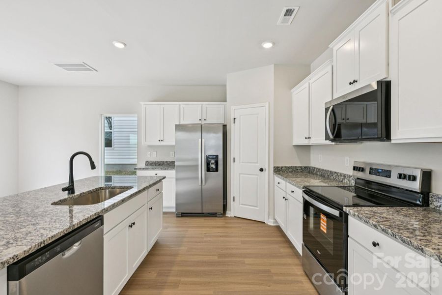 Furnished interior view inside a new home in Willow Estates, Shelby (Image 9).