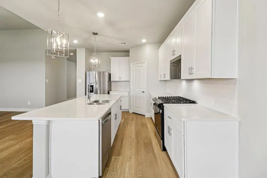 Furnished interior view inside a new home in Lakehaven - Premier Series, Farmersville (Image 8).