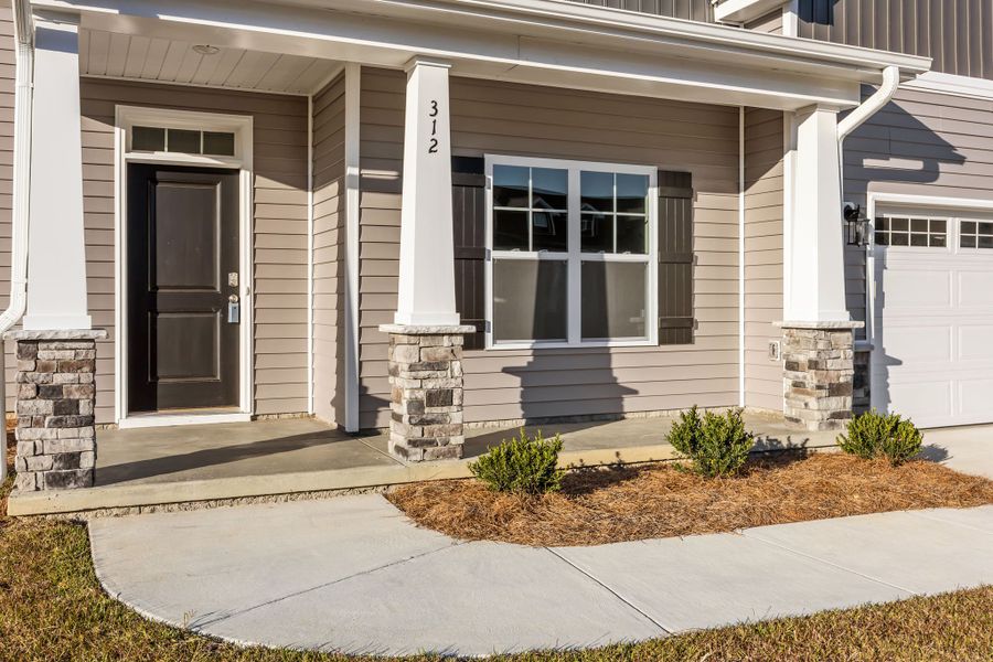 Exterior details and patio area of a home in Arbor Hills South II, Greenville (Image 23). Exterior details and patio area of a home in Arbor Hills South II, Greenville (Image 23).