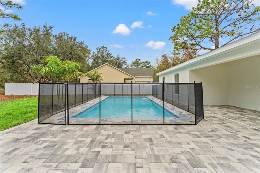 Exterior details and patio area of a home in , Brooksville (Image 39). Exterior details and patio area of a home in , Brooksville (Image 39).