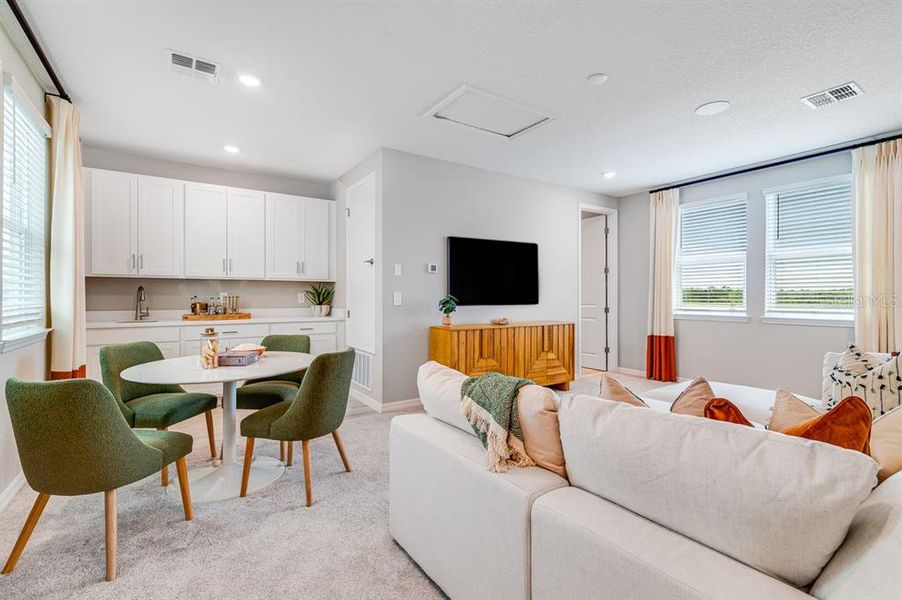 Furnished interior view inside a new home in Center Lake Ranch Community Group Page, St. Cloud (Image 5).