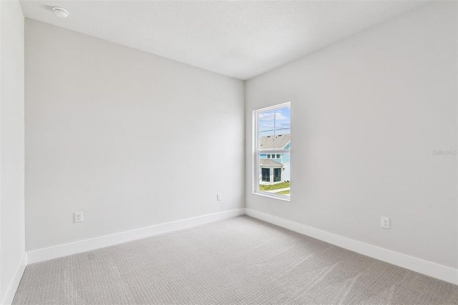 Spacious, unfurnished interior of a new home in Emerald Landing at Waterside at Lakewood Ranch – Cottage Series, Sarasota (Image 20).