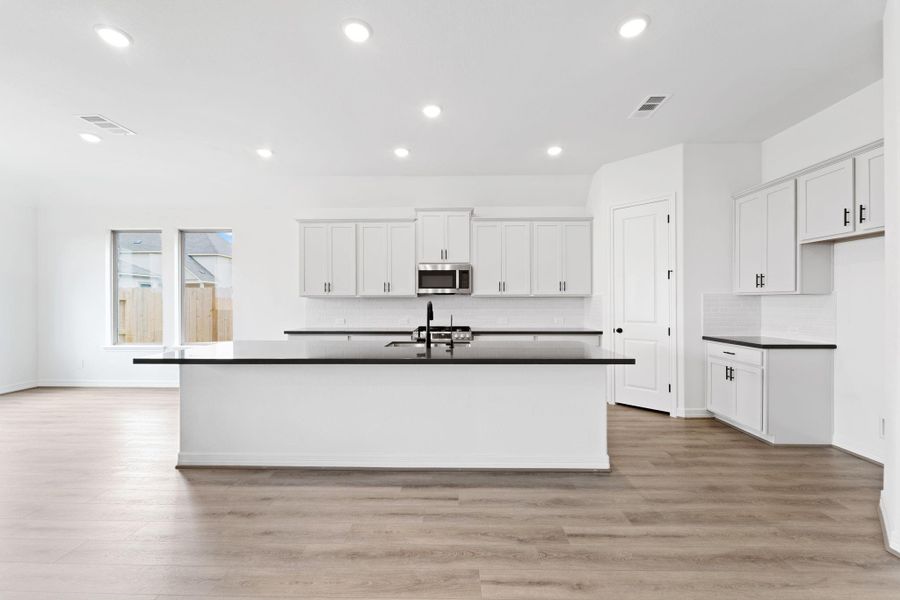Furnished interior view inside a new home in Oakwood Estates, Waller (Image 8).