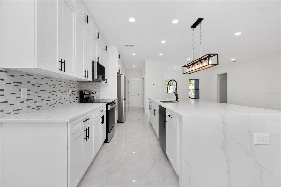 Furnished interior view inside a new home in , Port Charlotte (Image 40).