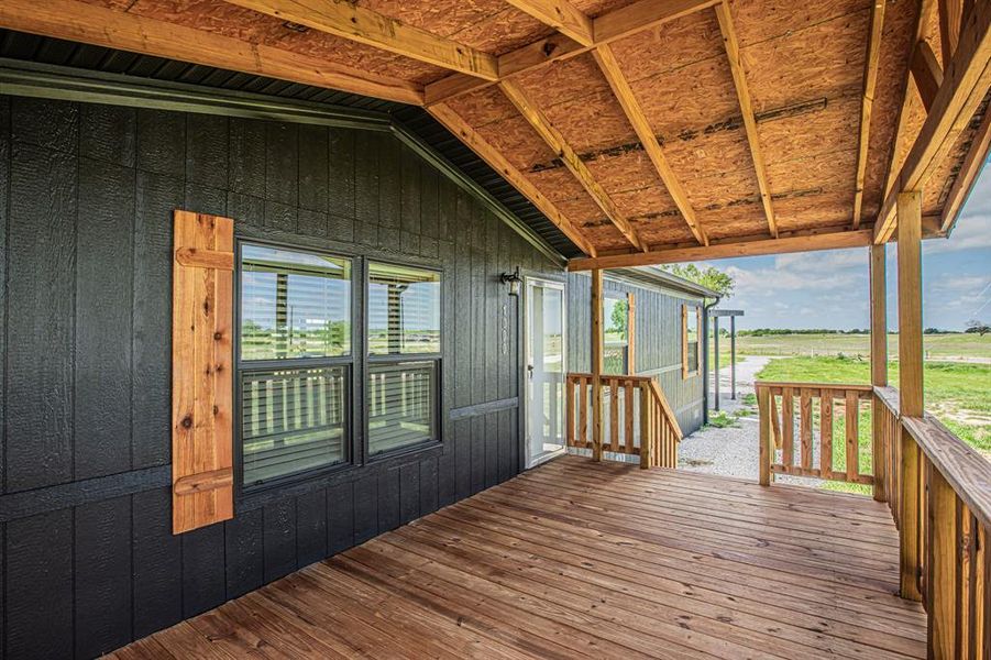 Exterior details and patio area of a home in , Poolville (Image 24).