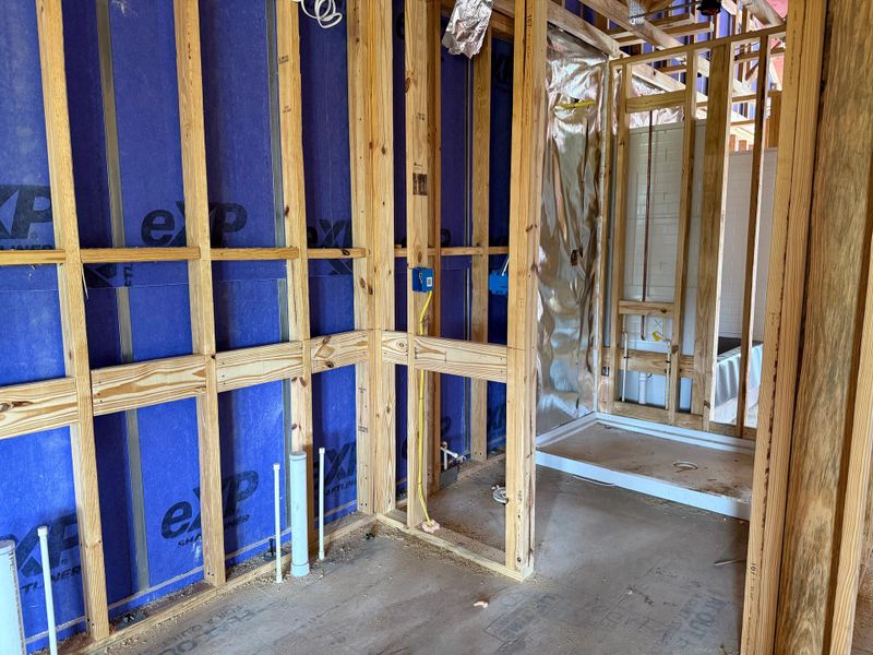 Luxurious primary bath featuring a spa-like frameless standing shower Luxurious primary bath featuring a spa-like frameless standing shower