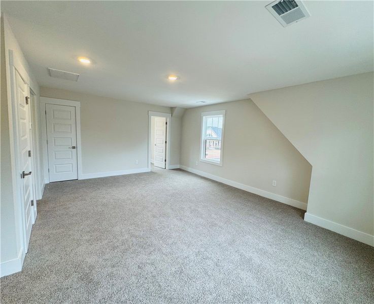 This spacious room offers comfort and versatility.