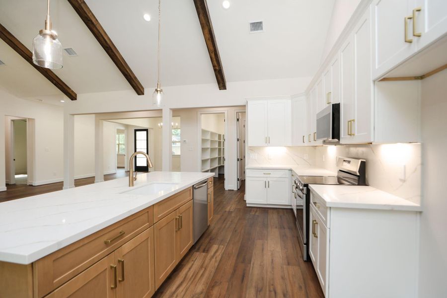 Furnished interior view inside a new home in , Magnolia (Image 5).