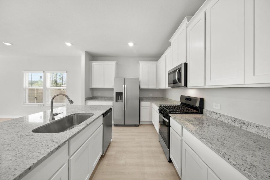 Furnished interior view inside a new home in Lexington Heights, Willis (Image 9). Furnished interior view inside a new home in Lexington Heights, Willis (Image 9).