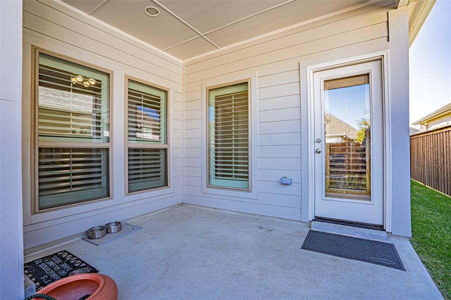 Exterior details and patio area of a home in Walsh Townhomes, Aledo (Image 3).