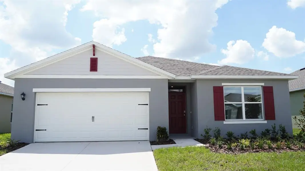 Front exterior of a new home in Willowbrook South, Winter Haven, FL, highlighting curb appeal (Image 1). Front exterior of a new home in Willowbrook South, Winter Haven, FL, highlighting curb appeal (Image 1).