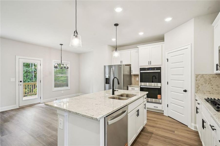 Furnished interior view inside a new home in Martin Springs - Estate Series, Lawrenceville (Image 7).