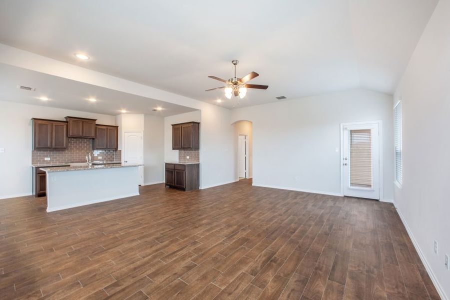 Representative exterior photo of a completed home built from the Wesley by Impression Homes in Heartland, Heartland, TX (Image 10). Representative exterior photo of a completed home built from the Wesley by Impression Homes in Heartland, Heartland, TX (Image 10).