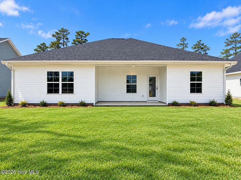 Exterior details and patio area of a home in East Lake, Leland (Image 3).