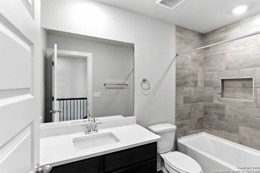 Furnished interior view inside a new home in August Fields, New Braunfels (Image 9).