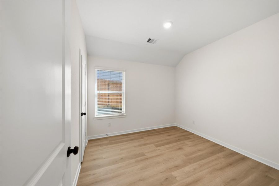 Secondary bedroom with large closet.